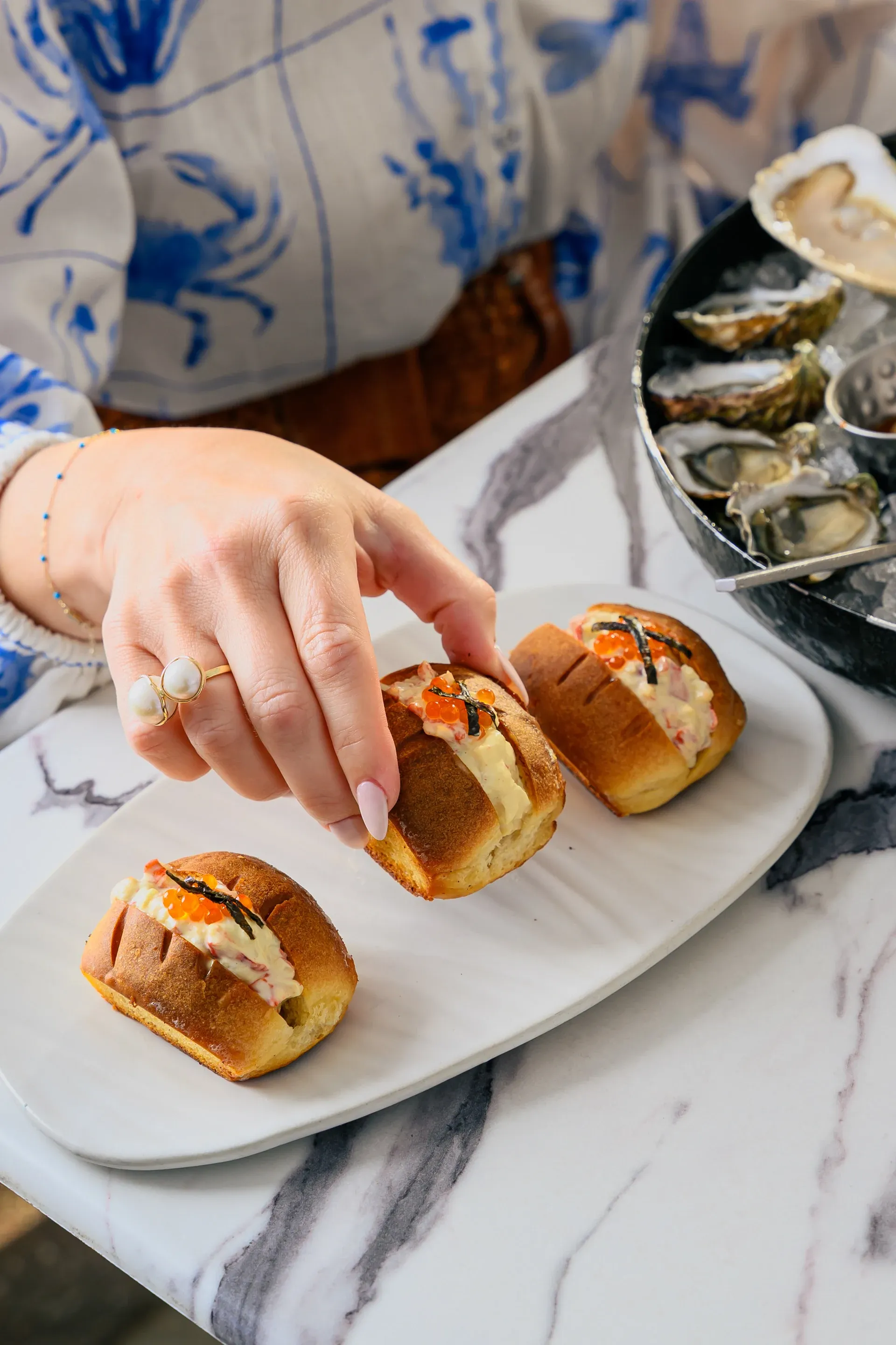 Lobster sliders at Brine photographed for The Infatuation guide
