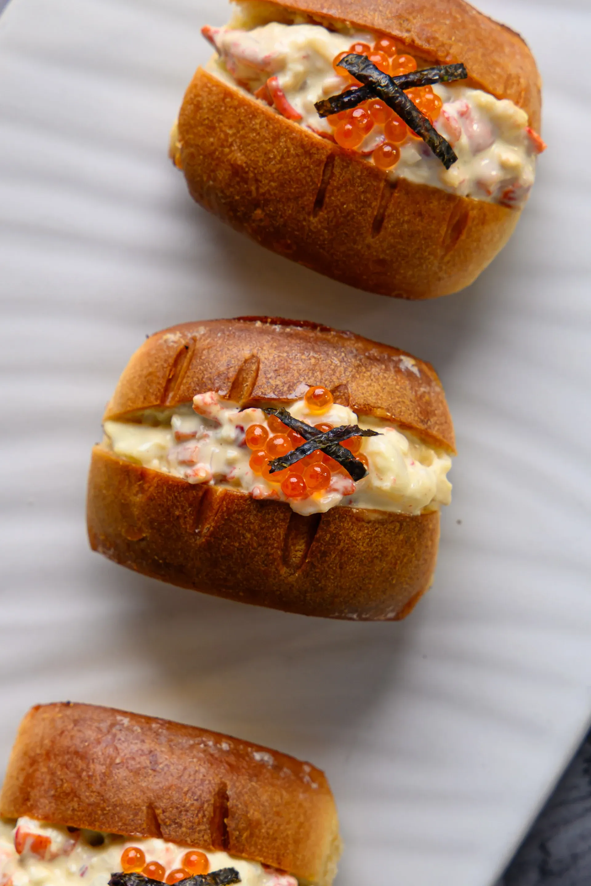 Lobster sliders at Brine photographed for The Infatuation guide