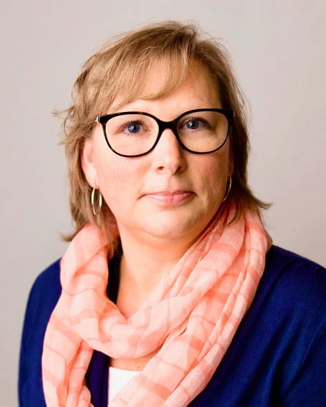 Geana — original headshot before the session