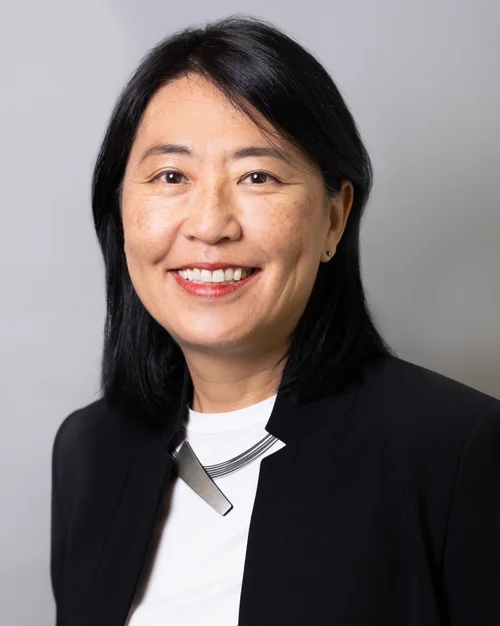 Mari — original headshot before the session