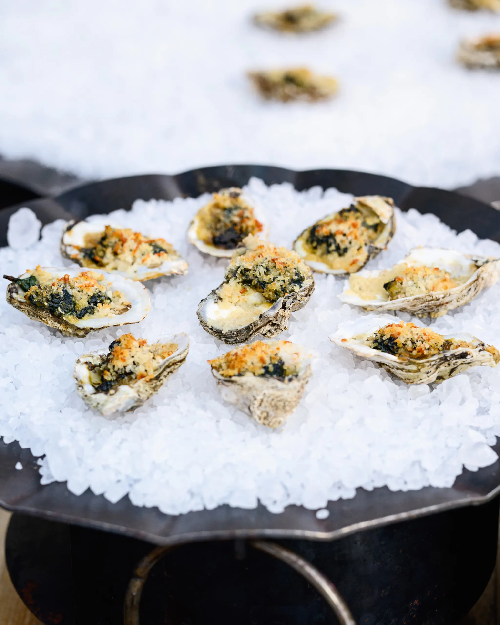 Oysters Rockefeller on rock salt at PRI