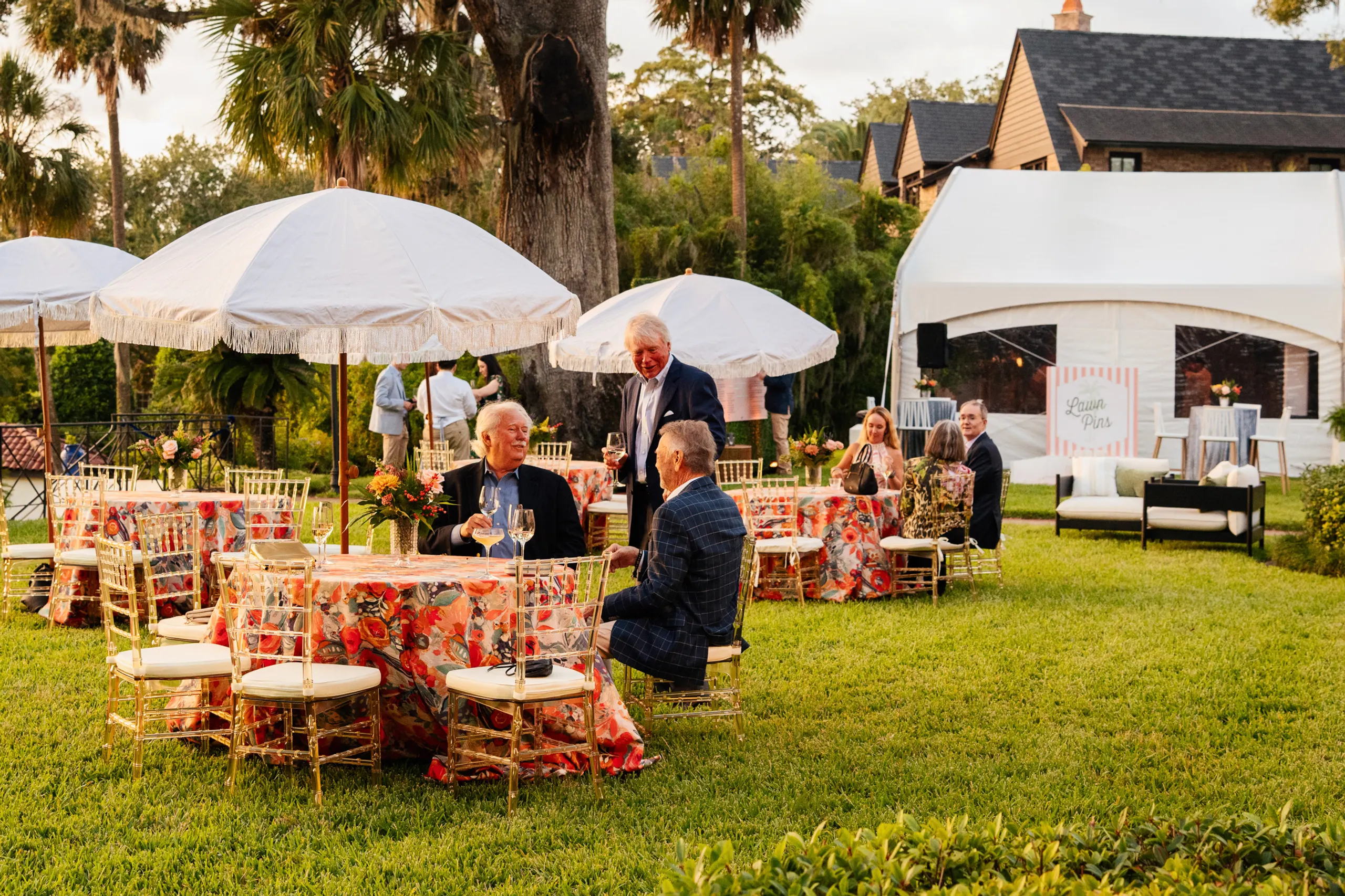Guests claiming tables at the San Marco Centennial Soirée