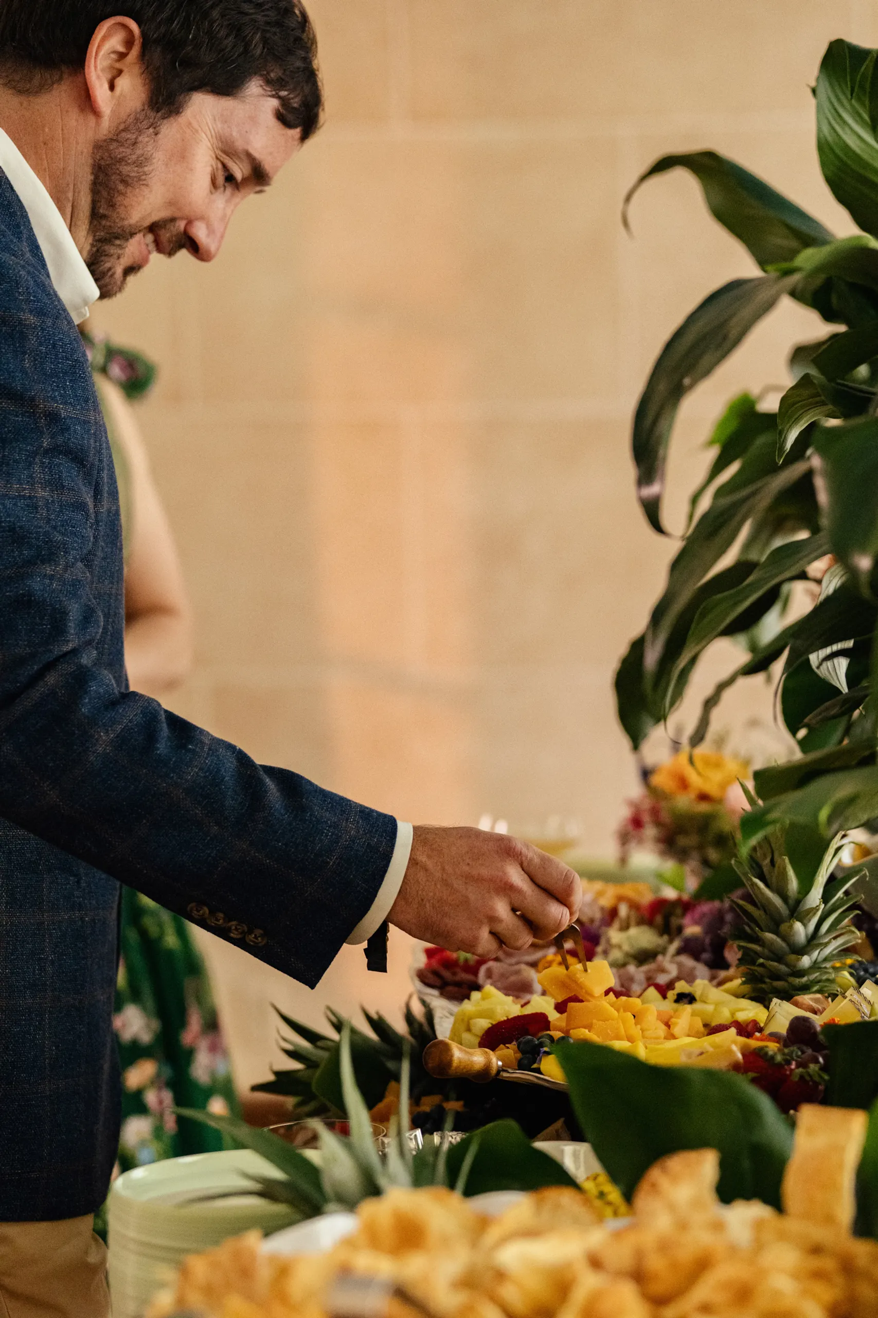 Guests enjoying charcuterie spread at the San Marco Centennial Soirée