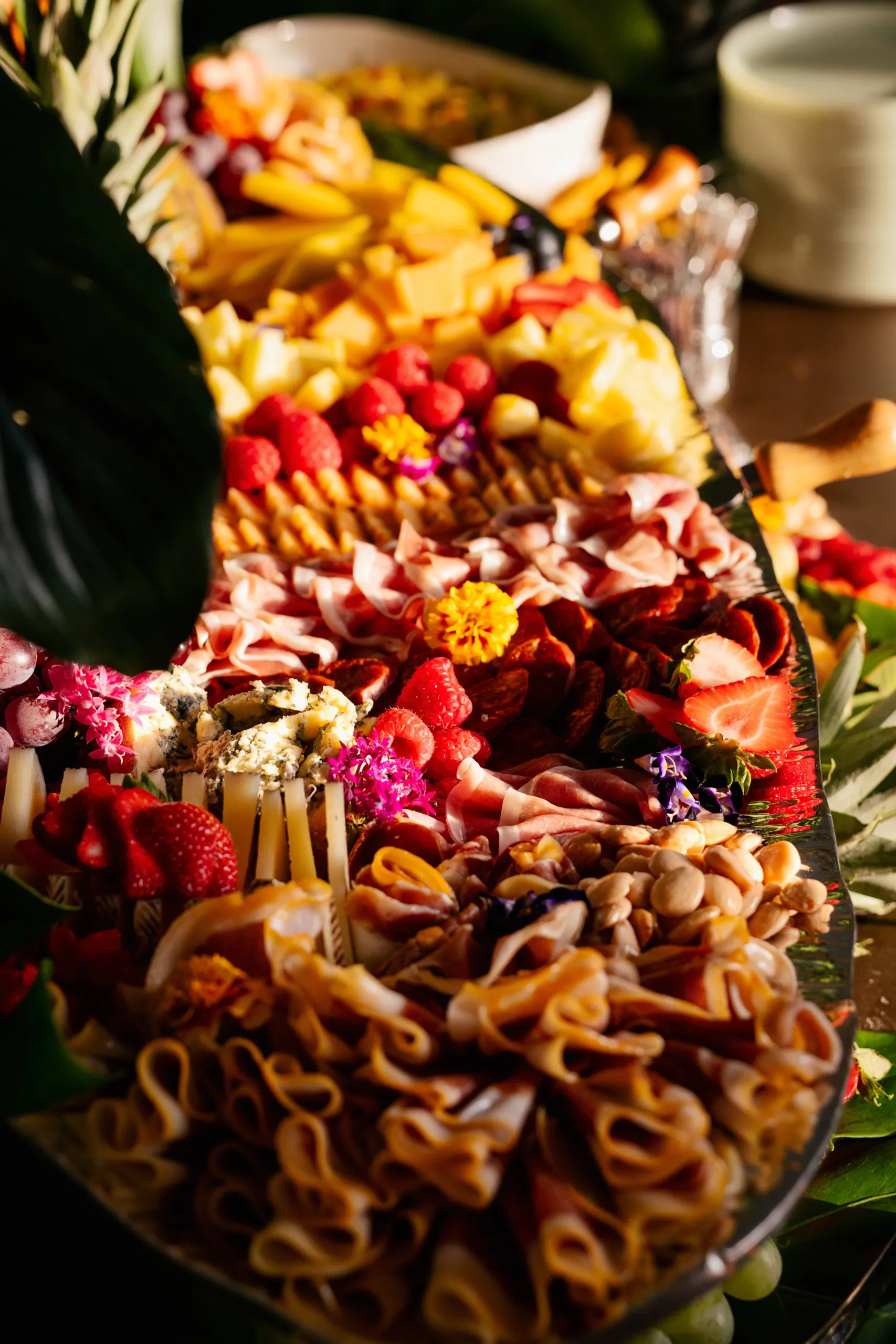 Close-up details of charcuterie spread at the San Marco Centennial Soirée