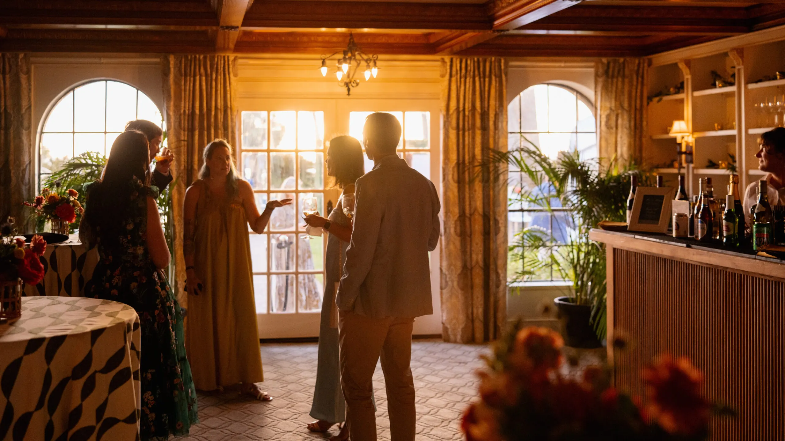 VIP lounge bar area with guests at the San Marco Centennial Soirée